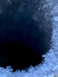 Close-up of ice crystals against black background