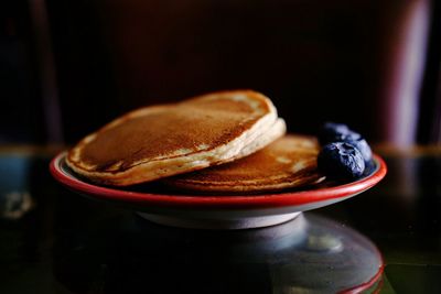 Close-up of bread in container on table