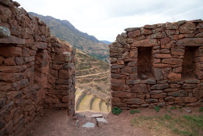 View of stone wall with mountain in background