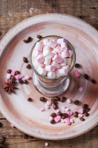 High angle view of marshmallow on drink at table