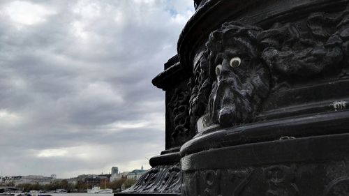 Low angle view of historical building against cloudy sky