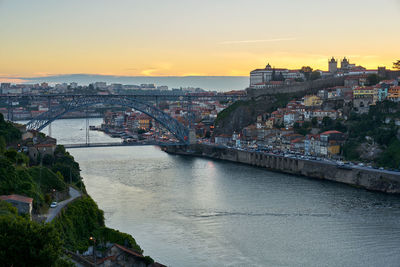 Porto city view from viewpoint in vila nova de gaia with nortada fog, portugal