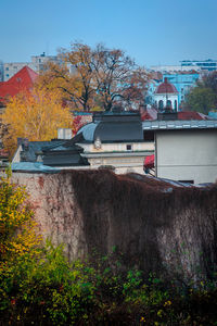 Houses against clear sky during autumn