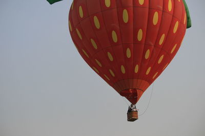 Low angle view of hot air balloon against clear sky