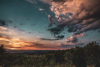 Scenic view of landscape against sky during sunset