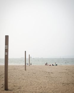 Scenic view of beach against clear sky