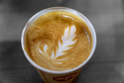 Close-up of cappuccino on table