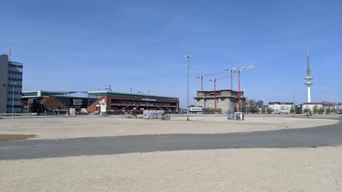 View of construction site against clear blue sky