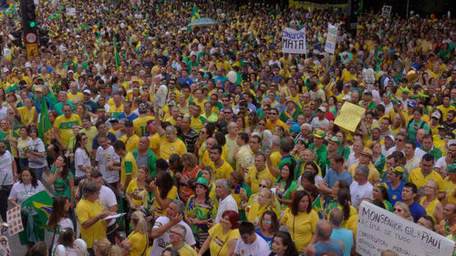 High angle view of protesters on city street