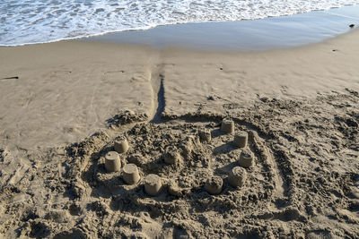 High-angle view of a sand castle on the beach