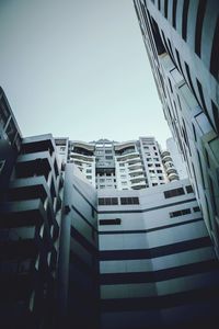 Low angle view of buildings against clear sky