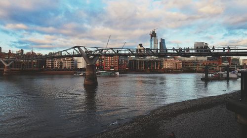 View of pier over river against sky