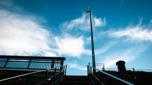 Low angle view of street light against sky