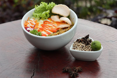 Close-up of salad in bowl on table