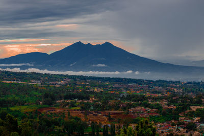 Scenic view of mountains against sky during sunset