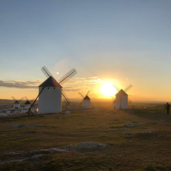 Scenic view of field against sky during sunset