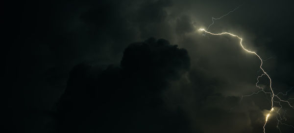 Low angle view of lightning at night