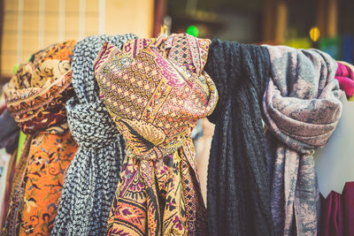 Close-up of clothes hanging on display at store
