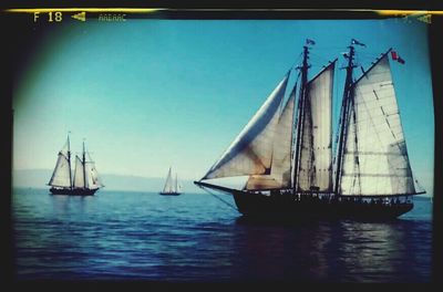 Boats sailing in sea