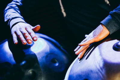 Midsection of man playing music concert