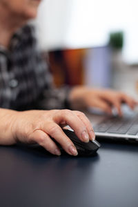 Close-up of person using mobile phone