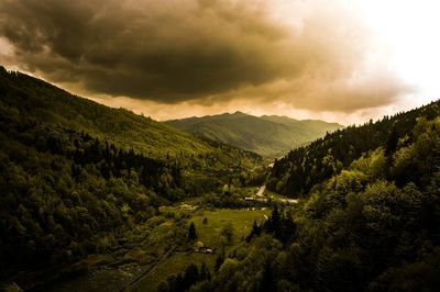 Scenic view of mountains against sky during sunset