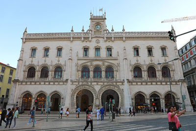 Group of people in front of building