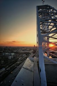 Cityscape against sky during sunset