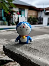 Close-up of toy in city