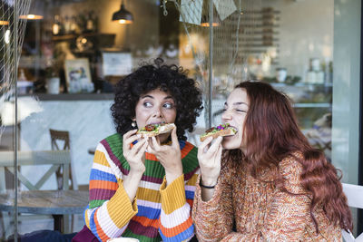 Young woman eating food