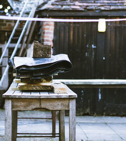 Old tarpaulin with furniture on table