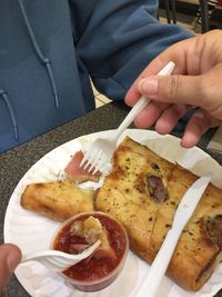 Close-up of man preparing food