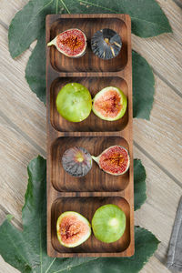 High angle view of fruits on cutting board