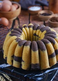 Close-up of hand holding cake