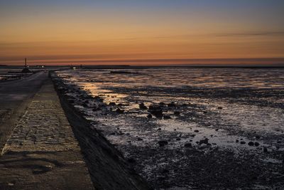 Scenic view of sea at sunset