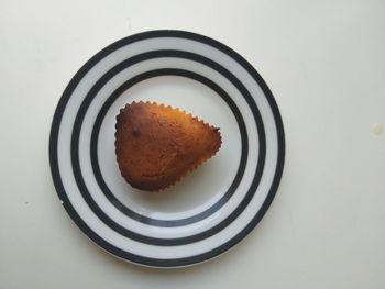 Directly above shot of cake in plate on table