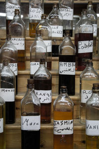 Close-up of text on glass bottles