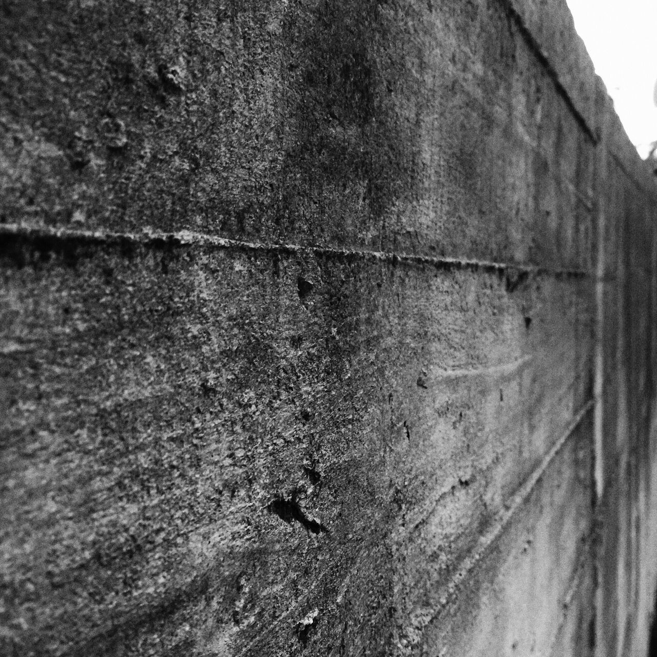textured, rough, weathered, full frame, wall - building feature, old, low angle view, architecture, backgrounds, built structure, close-up, no people, outdoors, day, damaged, pattern, nature, wall, cracked, deterioration