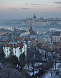 High angle view of city buildings during winter