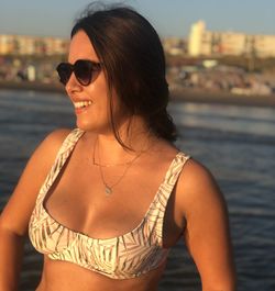 Young woman wearing sunglasses at beach