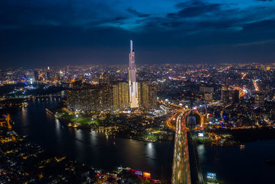 Top view aerial of center ho chi minh city and saigon bridge at sunset