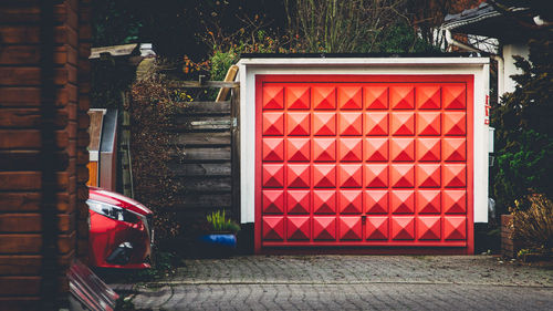 Closed red door of garage