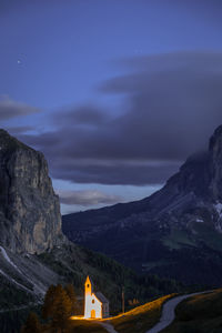 Scenic view of mountains against sky at night