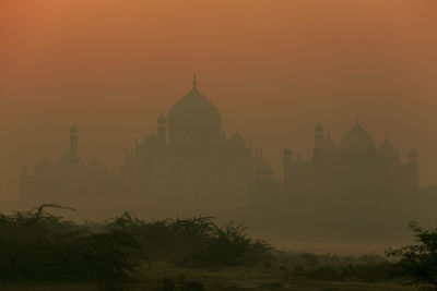 View of temple against sky during sunset