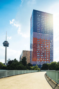 Modern buildings against sky in city