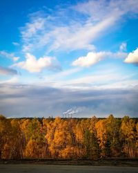 Scenic view of lake against sky during autumn