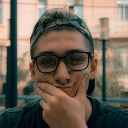 Portrait of young man wearing eyeglasses