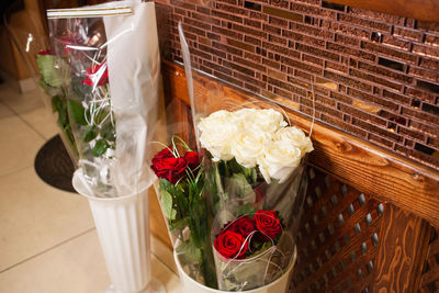 Bouquets of roses in an outdoor vase, a gift for the holiday. red