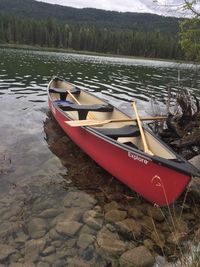 Boat moored on lake