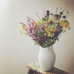 Close-up of flower vase on table